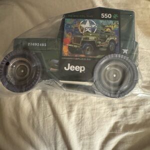BN Jeep Army truck puzzle in Collectible jeep Shaped Tin w/rolling wheels 550 pc